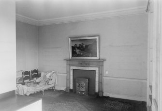 Interior view of Airlie Castle showing room to right of entrance hall with fireplace.