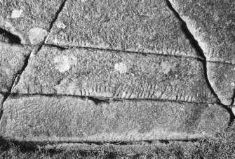Ogham stone and footmark