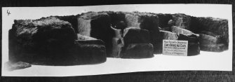 Excavation photograph; display of the four cists recovered.