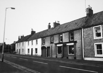 View from NE of row of dwellings opposite the Red Lion Hotel, High Street, Ayton (Numbers 41-37 from the left).
