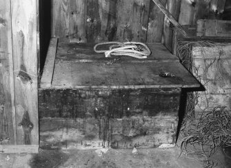 Interior.
Detail of wooden box with lid.