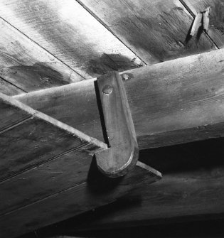 Interior.
Detail of shutter latch on ceiling beam.