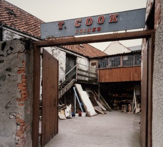 View from S of entrance to yard.