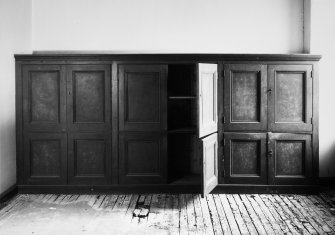 Interior.
Service wing, E room, detail of cupboard.