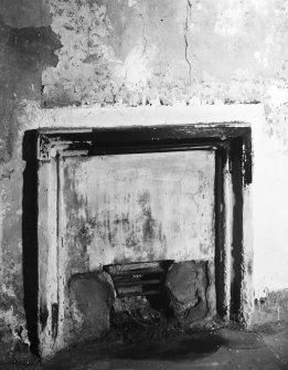 Interior.
Detail of basement chimneypiece in S wall.