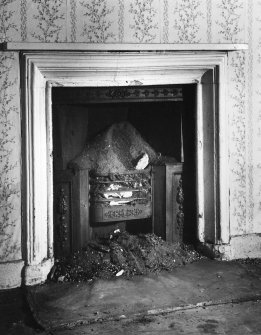 Interior.
Detail of basement chimneypiece in N wall.