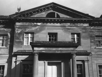 Detail of W elevation central pedimented entrance bay with porch.