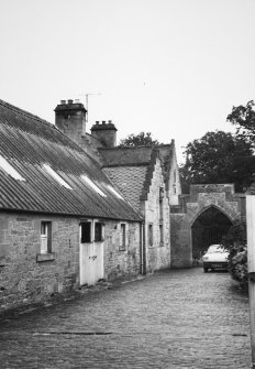 View showing cobbled road.