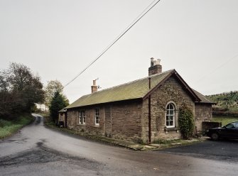 View from W of NW side and SW gable of former station building