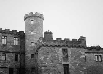 View of battlements and tower from SW.