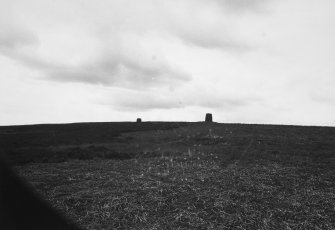 Distant view of both cairns.