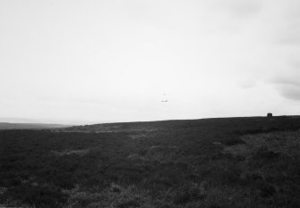 Distant view of one cairn.