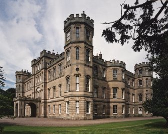 View of SE and SW elevations from S showing castellated tower