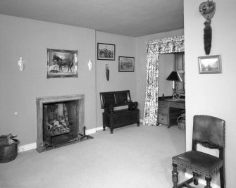 Interior. Entrance hall from SE with roll moulded fireplace