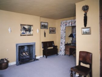 Interior. Entrance hall from SE with roll moulded fireplace
