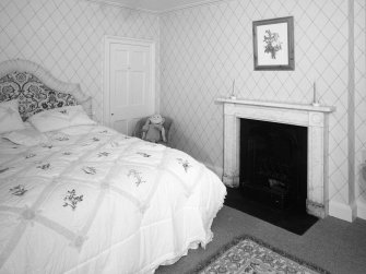 Interior. First Floor central block bedroom with early 19th century marble fireplace