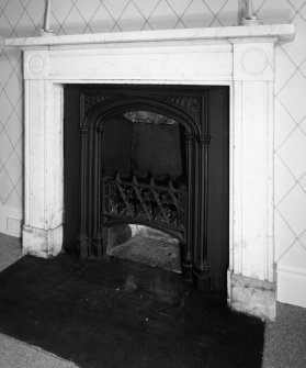 Interior. First Floor central block bedroom fireplace
