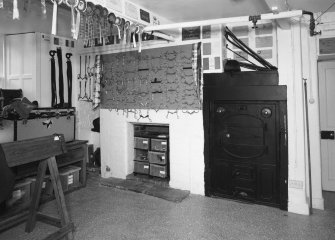 Interior. Basement former kitchen showing range