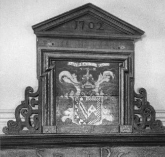 Interior.
Detail of heraldic timber panel dated 1702.