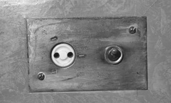 Interior.
Detail of light switch and socket.