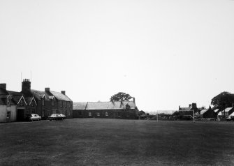 View of The Green showing S and W sides. Shows No. 10 The Green, Bothwell House.