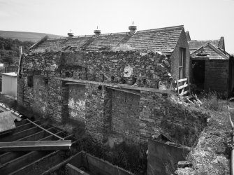 View of exposed side of former pump house from N