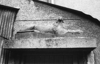 Detail of pediment over kitchen door.