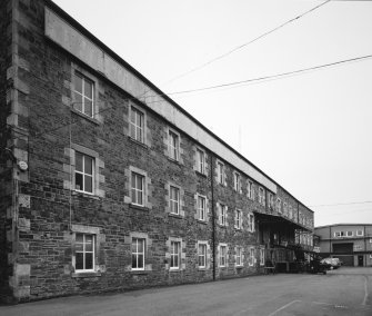 Selkirk, Dunsdale Haugh, Dunsdale Road, Riverside Mills
View from south of south east side of original spinning mill. At the time of the survey, the mill was used predominantly as a warehouse.