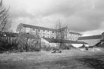 Selkirk, Dunsdale Haugh, Dunsdale Road, Riverside Mills
General view from south of New Mill (1863), with the lower floor obscured by a single-storeyed wooden waste wool store in the foreground
