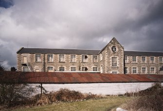 Selkirk, Dunsdale Haugh, Dunsdale Road, Riverside Mills
View from south east of New Mill (1863), with the lower floor obscured by a single-storeyed wooden waste wool store in the foreground
