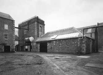 Selkirk, Dunsdale Haugh, Dunsdale Road, Riverside Mills
View from north of former engine house (originally housed a beam engine), with cast-iron water tank on roof, and Teasing Department (situated in lower building to right)