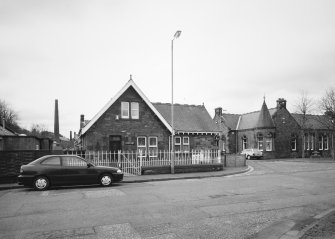 General view from NE showing St. Mary's Lodge  in foreground, and St Mary's Mill in the background.