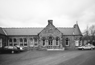 View from SE of SE facade of former Offices, housed in the E corner of the mill (at time of survey, offices and reading rooms of Scottish Borders Archives).