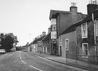 General view looking E towards Eastgate showing the Text House.