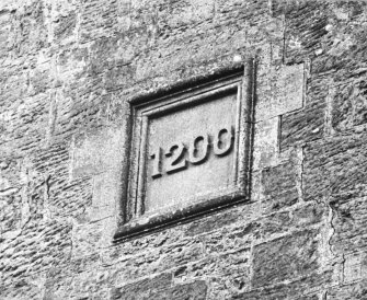 Deatil of date stone in E facade.