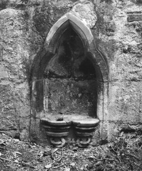 Interior.
Detail of arched niche in S wall of S wing.