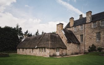 View of thatched extension from SE