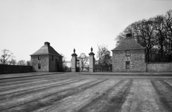 View of East Lodge and gates from E