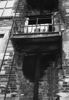 Detail of cast iron bracket supporting vertical lineshaft and gearbox on SW gable.