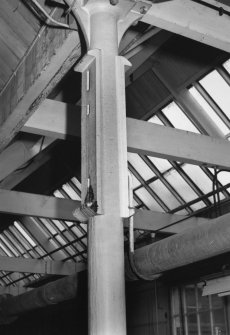 Interior.
Carding shed, detail of column with lineshaft bearing brackets.