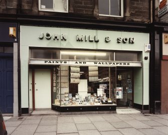 View from SE of John Mill and Son shop front.
