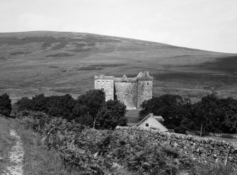 General view of Hermitage Castle from SW with Park Wall in background.