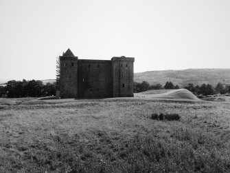 General view of Hermitage Castle and earthworks from N.