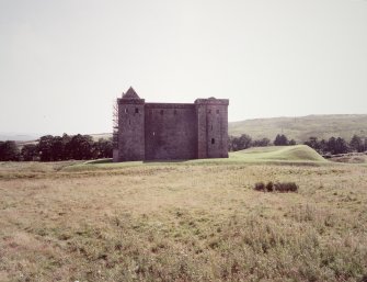 General view of Hermitage Castle and earthworks from N.