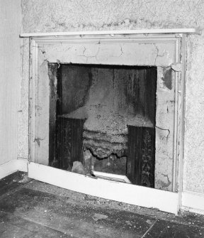 Interior.
Basement, N room, detail of fireplace.