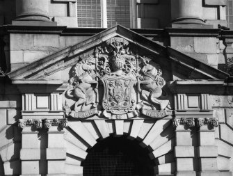 Detail of burgh arms over main doorway of SW front.