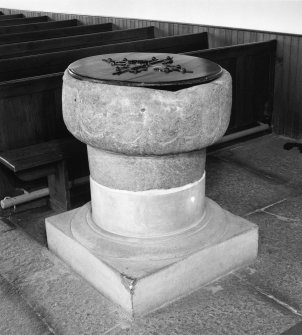 Interior. nave. Detail of freestone norman font