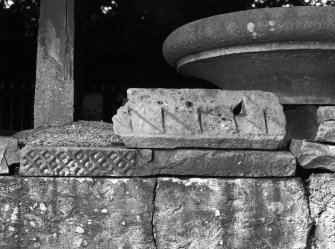 Interior.
Detail of carved stone fragment.