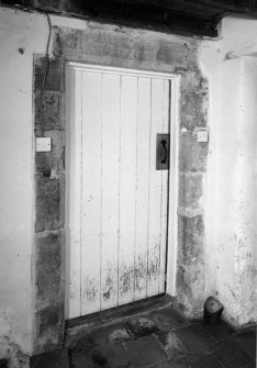 Interior.
Utility room, detail of door with 1717 dated panel over.