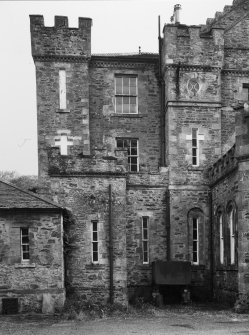 Detail of NW facade of service courtyard.